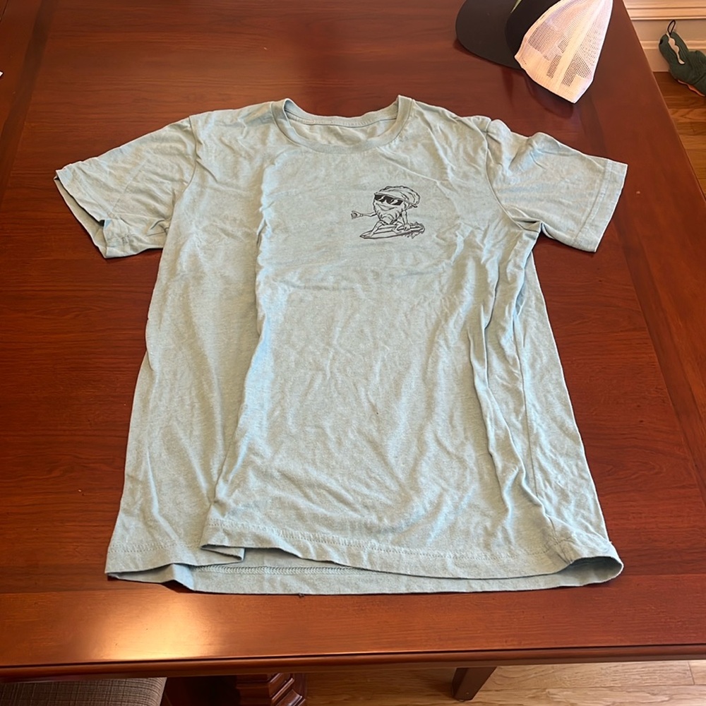 Pump House Surf Shop blue tee.